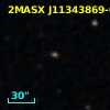 2MASX J11343869-0558474