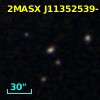 2MASX J11352539-1227373