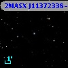 2MASX J11372338-1228007
