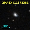 2MASX J11372381-2017297