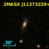 2MASX J11373229+0920018