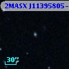 2MASX J11395805-0356560