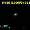 2MASX J12060943+3110023