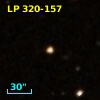 2MASS J12110183+2918255