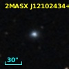 2MASX J12102434+1310144