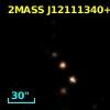 2MASS J12111340+1219373