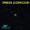 2MASX J12051218-0359509