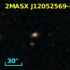 2MASX J12052569-0332370