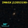2MASX J12053190-0338510