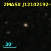 2MASX J12102192-0333311