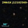 2MASX J12102560-0532051