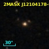 2MASX J12104178-0535181