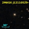 2MASX J12110529-0538013