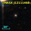 2MASX J12111468-0556388