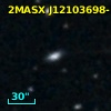 2MASX J12103698-1946185