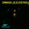 2MASX J12135703+2942591