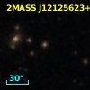 2MASS J12125623+2726572