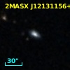 2MASX J12131156+2443002