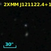 2MASS J12112245+1309367