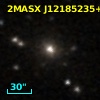 2MASX J12185235+0514443