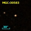 2MASS J12135621+0003345