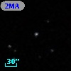 2MASS J12150387+0003078