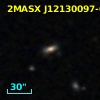 2MASX J12130097-0349382