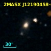2MASX J12190458-0459362