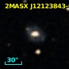 2MASX J12123843-0631339