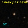2MASX J12112629-0650183