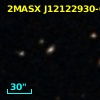 2MASX J12122930-0558559
