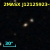 2MASX J12125923-0601565