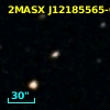 2MASX J12185565-0652309