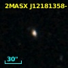 2MASX J12181358-1026487
