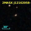 2MASX J12162058-1210382
