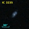 2MASX J12225786+1332446