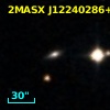 2MASX J12240286+1050558