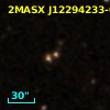 2MASX J12294233-0308038