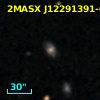 2MASX J12291391-0643033