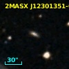 2MASX J12301351-0556352