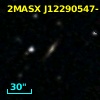 2MASX J12290547-1140563