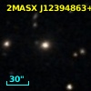 2MASX J12394863+1059547