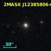 2MASX J12385806+0301414