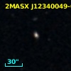 2MASX J12340049-0551419