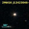 2MASX J12423046-0535261