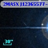 2MASX J12365577-0549387