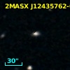 2MASX J12435762-0608018