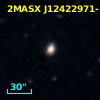 2MASX J12422971-1130544