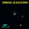 2MASX J12422395-1209069