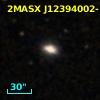 2MASX J12394002-1543385